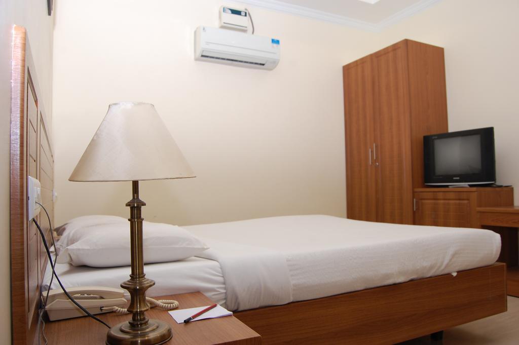 Hotel Sona'S Tiruchirappalli Szoba fotó